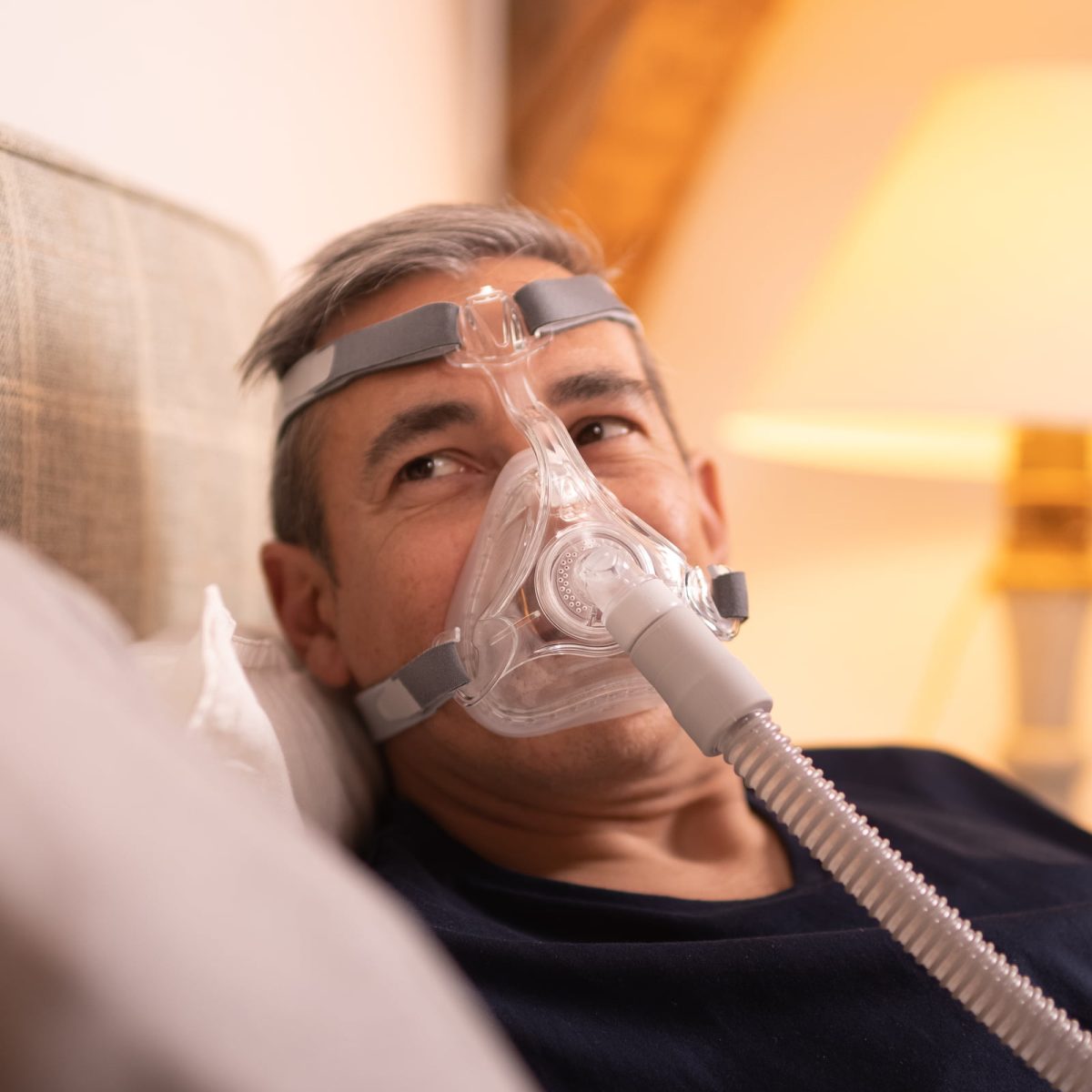 Man with a CPAP mask on